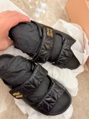 Miu Miu Black Quilted Slides